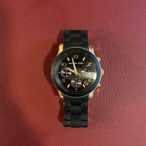 Michael Kora watch black and gold